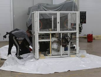 Фото Упаковка оборудования в термоусадочную пленку и изготовление жесткой глухой обрешетки #86