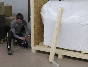 Фото Упаковка оборудования в термоусадочную пленку и изготовление жесткой глухой обрешетки #116