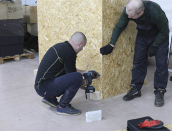 Фото Упаковка оборудования в термоусадочную пленку и изготовление жесткой глухой обрешетки #130